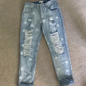 Distressed light wash star jeans